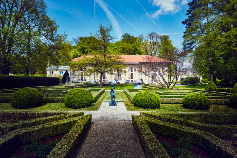 French garden and clipped boxwood hedges at L'Orangerie wedding venue in Mondorf-les-Bains, Luxembourg